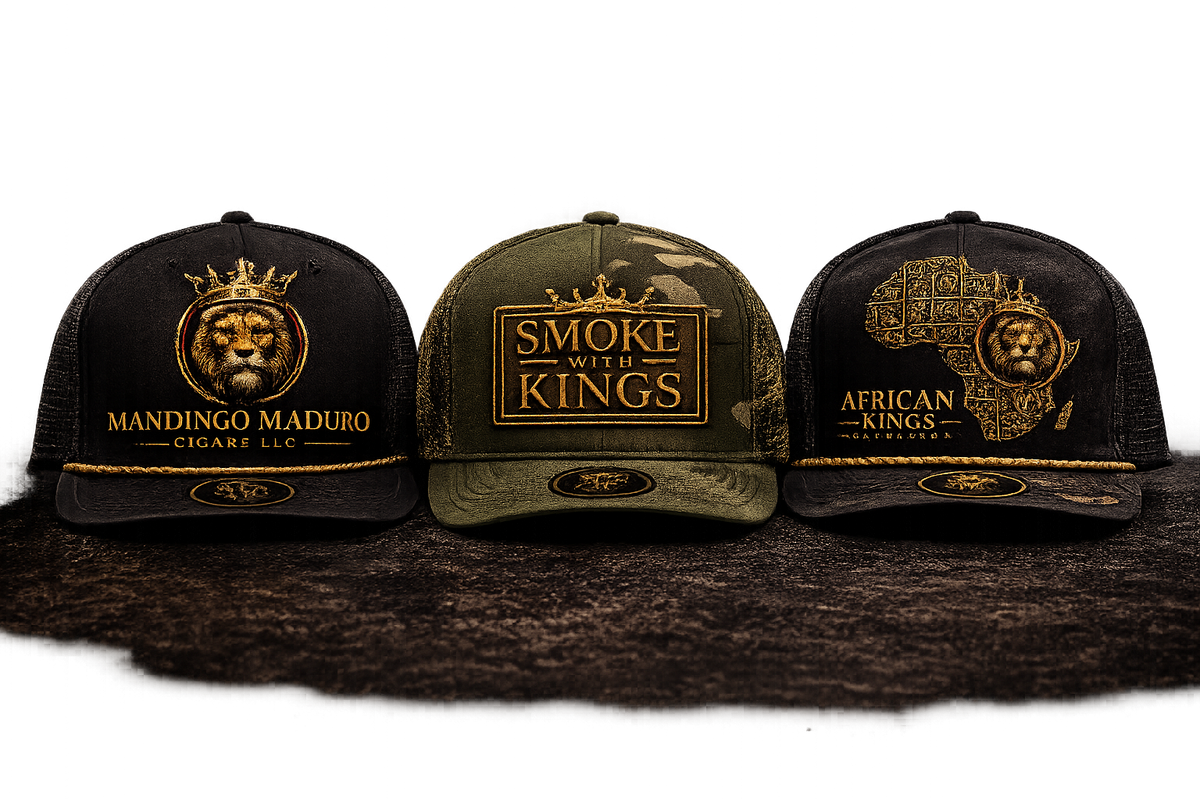 Mandingo Maduro Cigars LLC black trucker hat with gold crowned lion logo